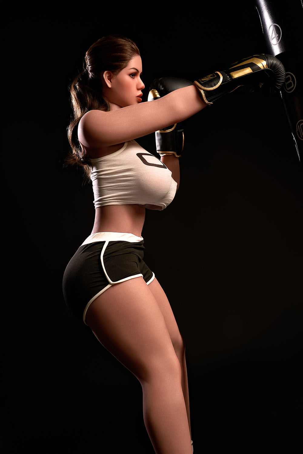 163cm Hybrid Sex Doll Diana Full body side view of woman in boxing gear punching a bag