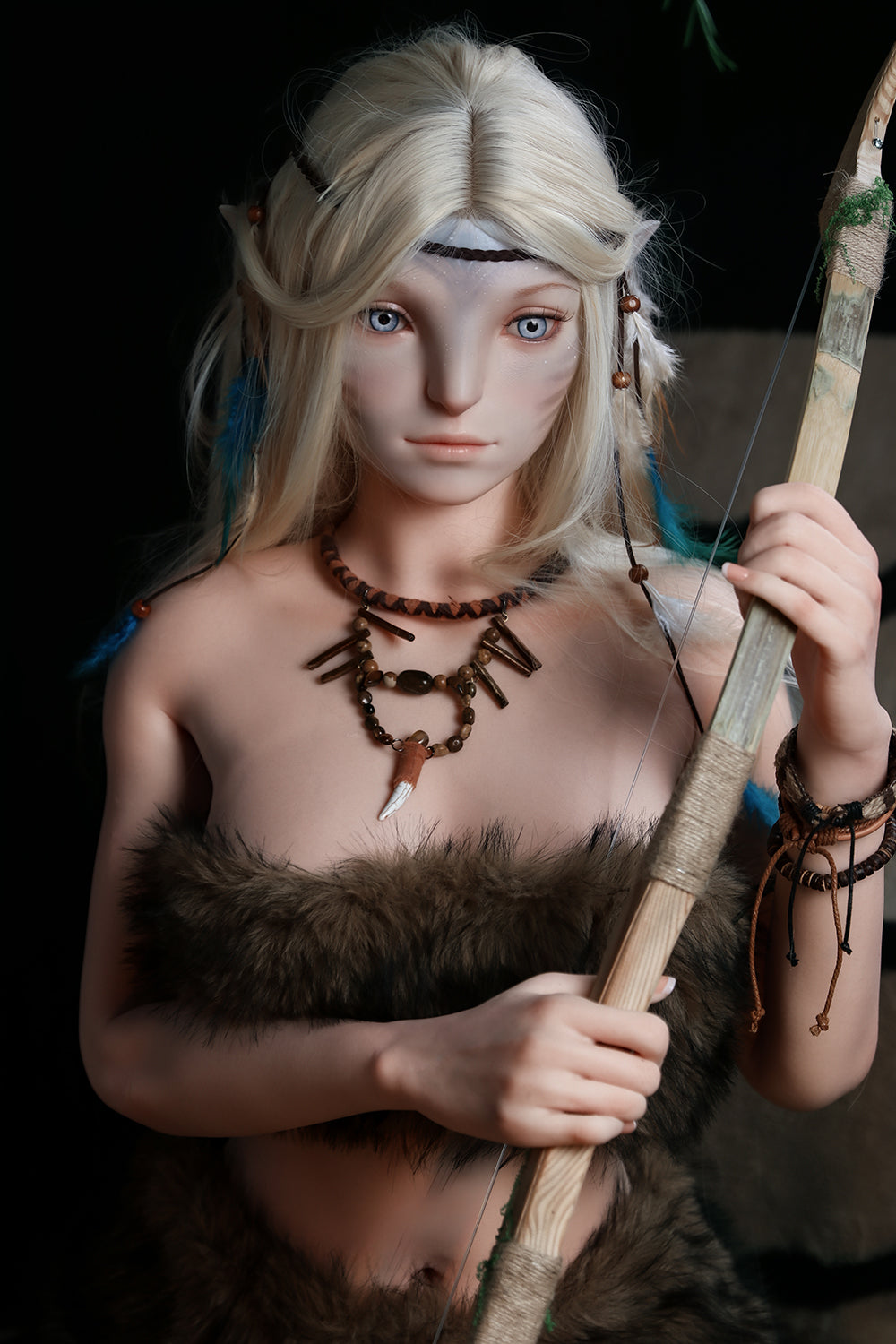 170cm Silicone Sex Doll Madeline Medium shot of a blonde elf figure holding a bow and wearing fur clothing