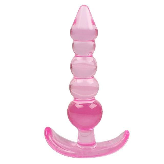 A pink translucent silicone adult love doll accessory with a beaded design on a white background