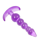 Мягкий желейный силиконовый массажер для анального шва с пробкой - фиолетовый